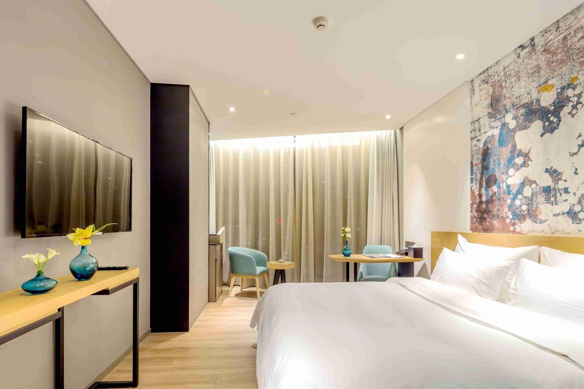 M Hotel Чжэнчжоу Экстерьер фото